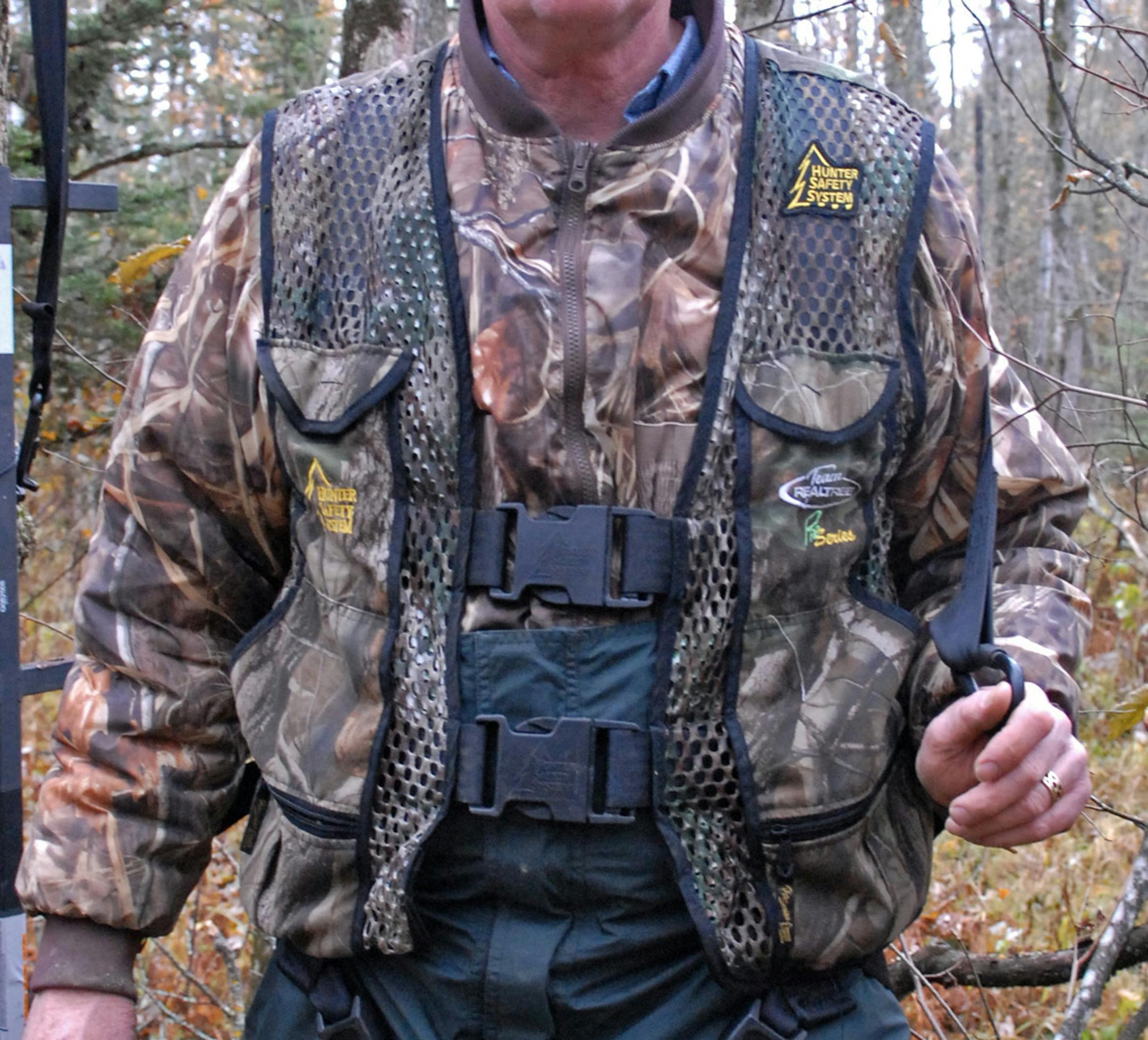 Tree stand safety begins and ends with a safety harness or vest. Harnesses are similar to those worn by utiliity linemen. Vests are adaptations that for many hunters are easier and quicker to put on and take off, especially in the dark. Both are designed to catch the hunter if he or she falls and distribute body weight equally in such an event. Old style safety belts that hunters once used to hold them in a tree ‚Äî and in some cases are still used ‚Äî can be da