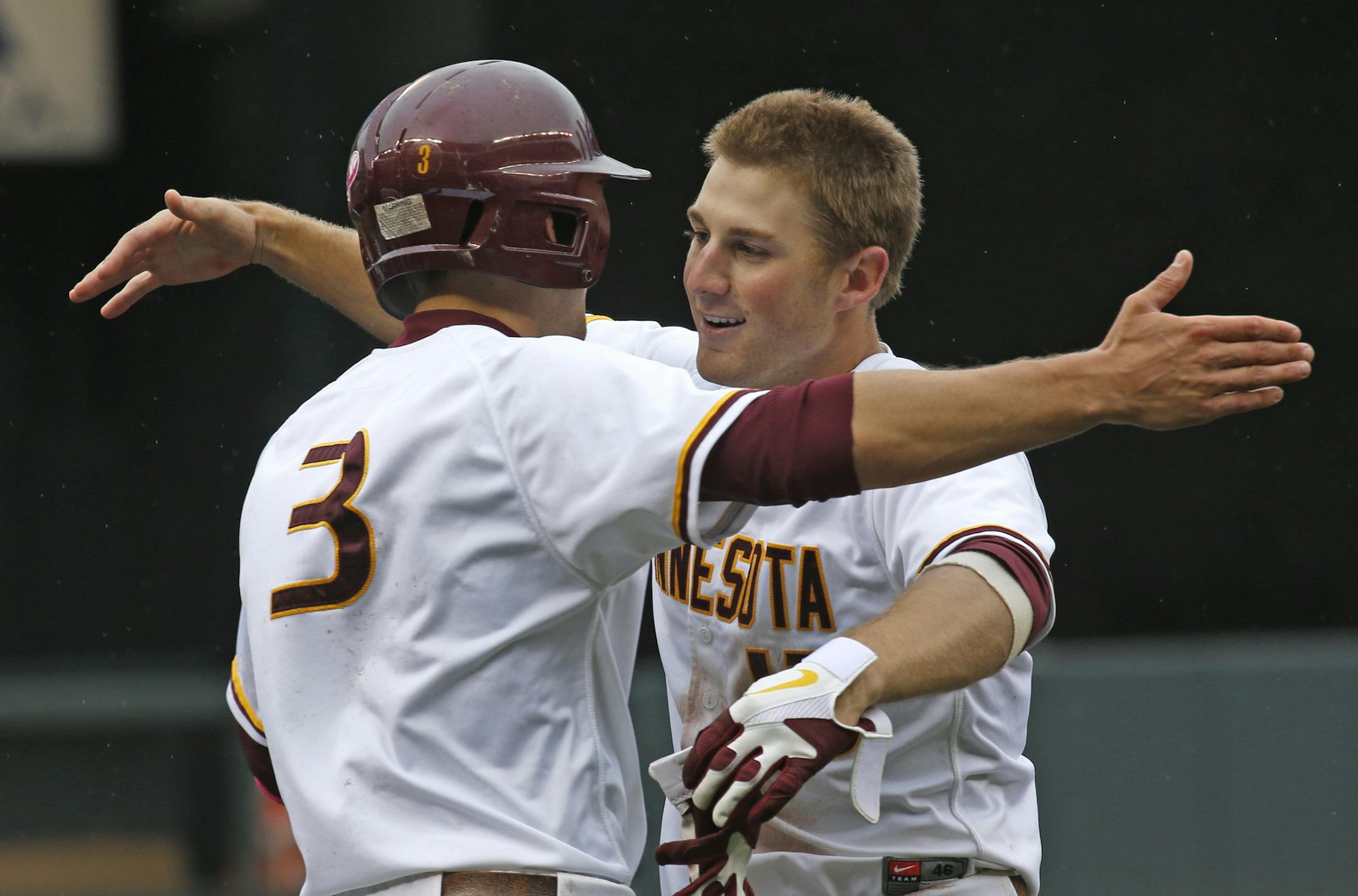 University of Minnesota vs. Illinois, Big 10 Baseball Tournament, Target Field, 5/22/13. (left to right) University of Minnesota's Troy Larson, who scored the winning run and Andy Henkemeyer, who hit the winning single in the 9th inning, celebrated at the end of the game.] Bruce Bisping/Star Tribune bbisping@startribune.com Troy Larson, Andy Henkemeyer/roster.