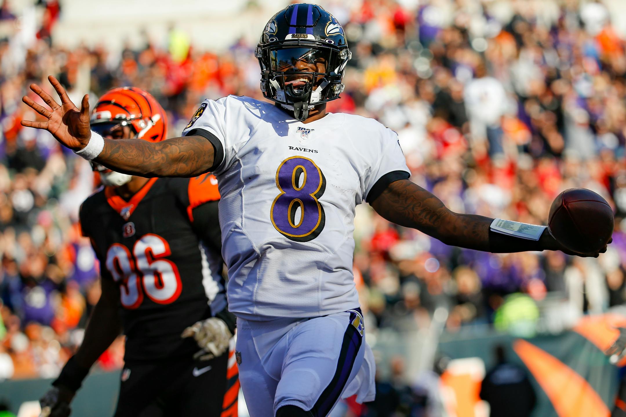 Baltimore Ravens quarterback Lamar Jackson (8) celebrates his touchdown during the second half of NFL football game against the Cincinnati Bengals, Sunday, Nov. 10, 2019, in Cincinnati. (AP Photo/Frank Victores)