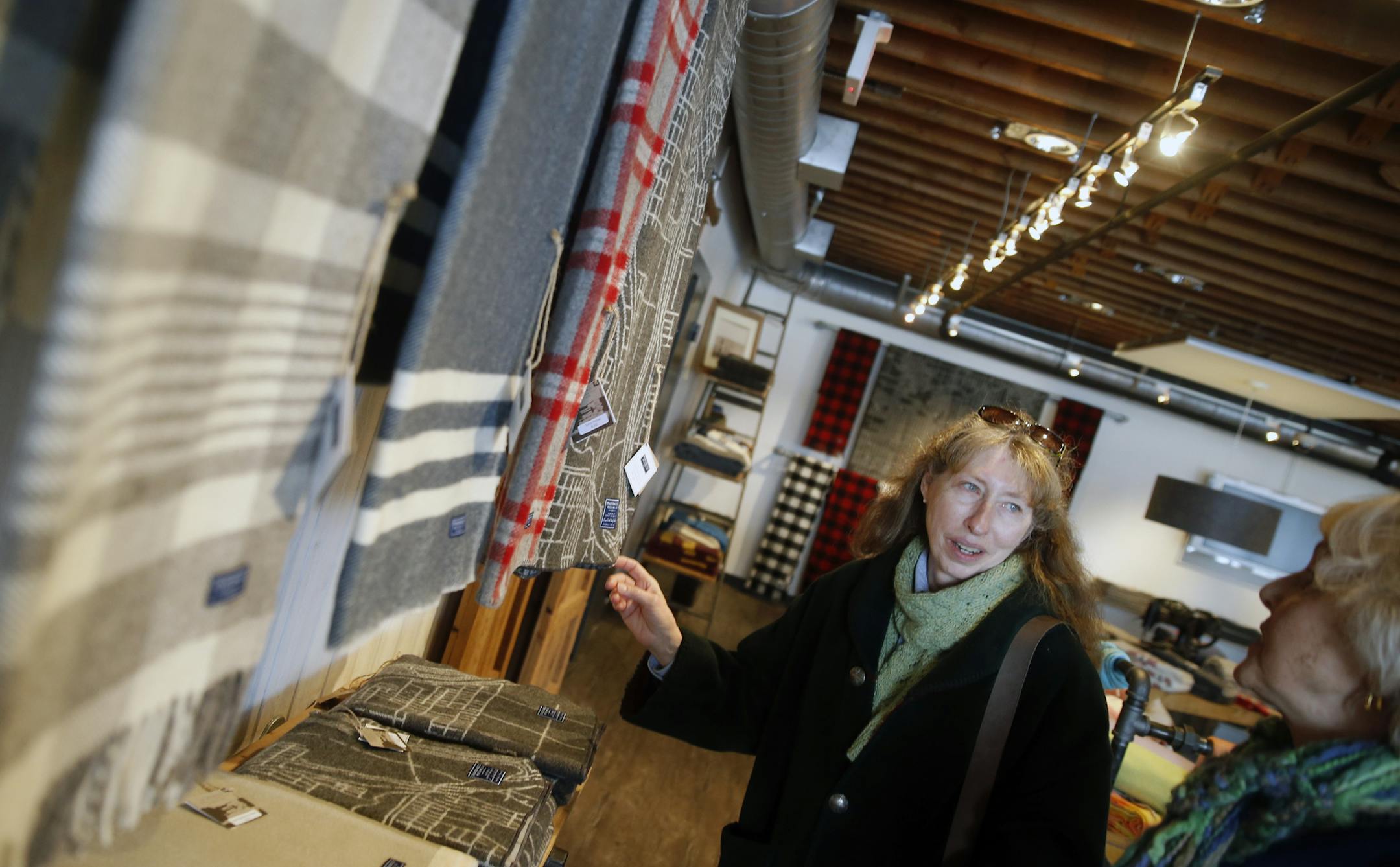 At Faribault Woolen Mill, Rebecca Crutchfield and Rachelle Pultrone of Iowa City checked out the gift shop which features "Loomed in the Land of Lakes" wool blankets and throws.]richard.tsong-taatarii/rtsong-taatarii@startribune.com