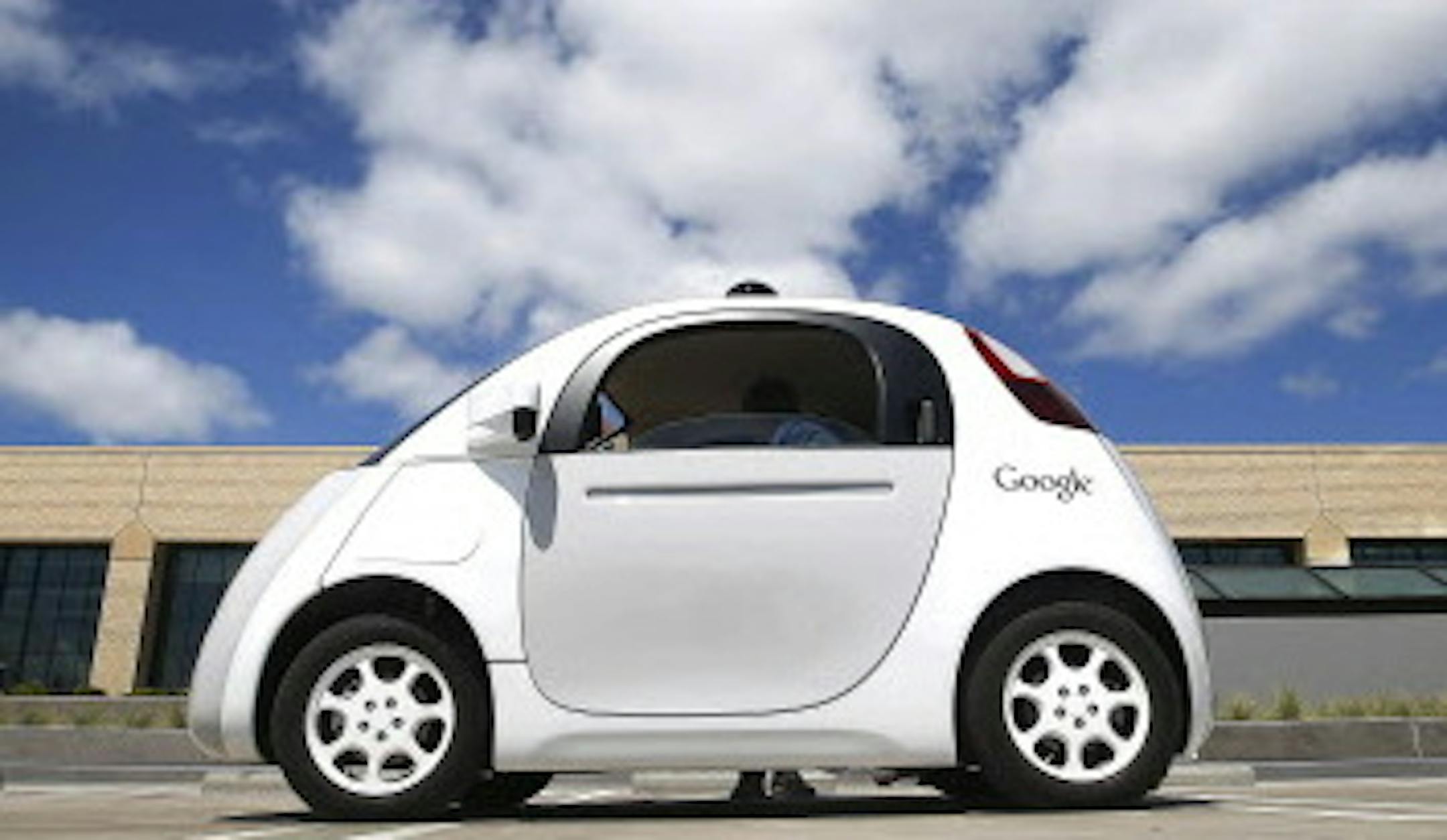 FILE - In this May 13, 2015, file photo, Google's new self-driving prototype car is presented during a demonstration at the Google campus in Mountain View, Calif. California unveiled precedent-setting draft rules Wednesday, Dec. 16, 2015 that would slow the public's access to self-driving cars of the future until regulators are confident the technology is safe. (AP Photo/Tony Avelar, File)