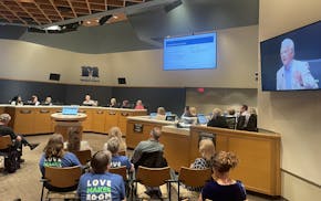 Minnetonka Mayor Brad Wiersum, visible on the screen and in the middle of the dais, spoke shortly before the Minnetonka City Council on Monday night a