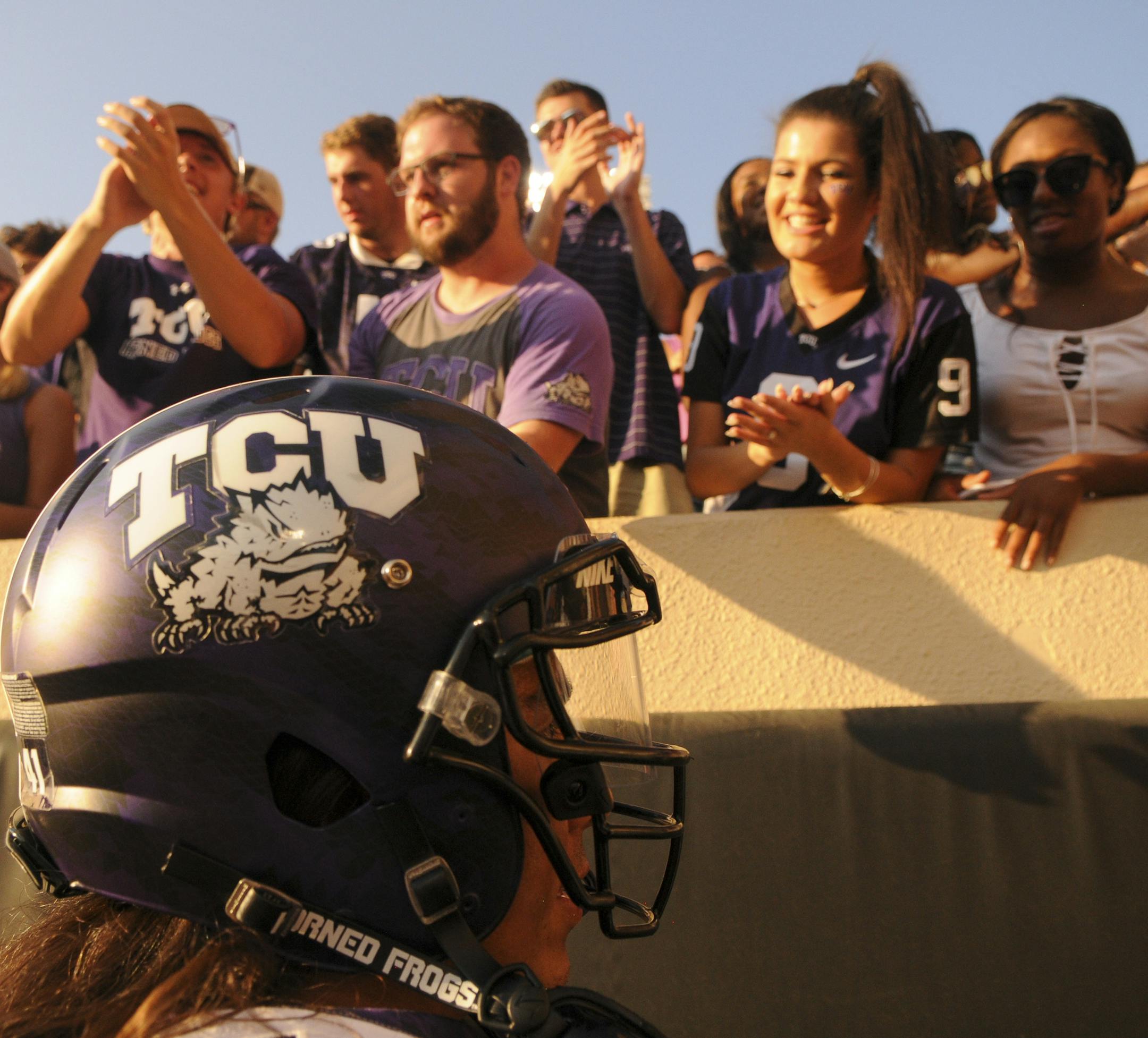 TCU fullback Pakamiaiaea Davis celebrates with fans following an NCAA college football game between TCU and Oklahoma St in Stillwater, Okla., Saturday, Sept. 23, 2017.(AP Photo/Brody Schmidt) ORG XMIT: OKBS103