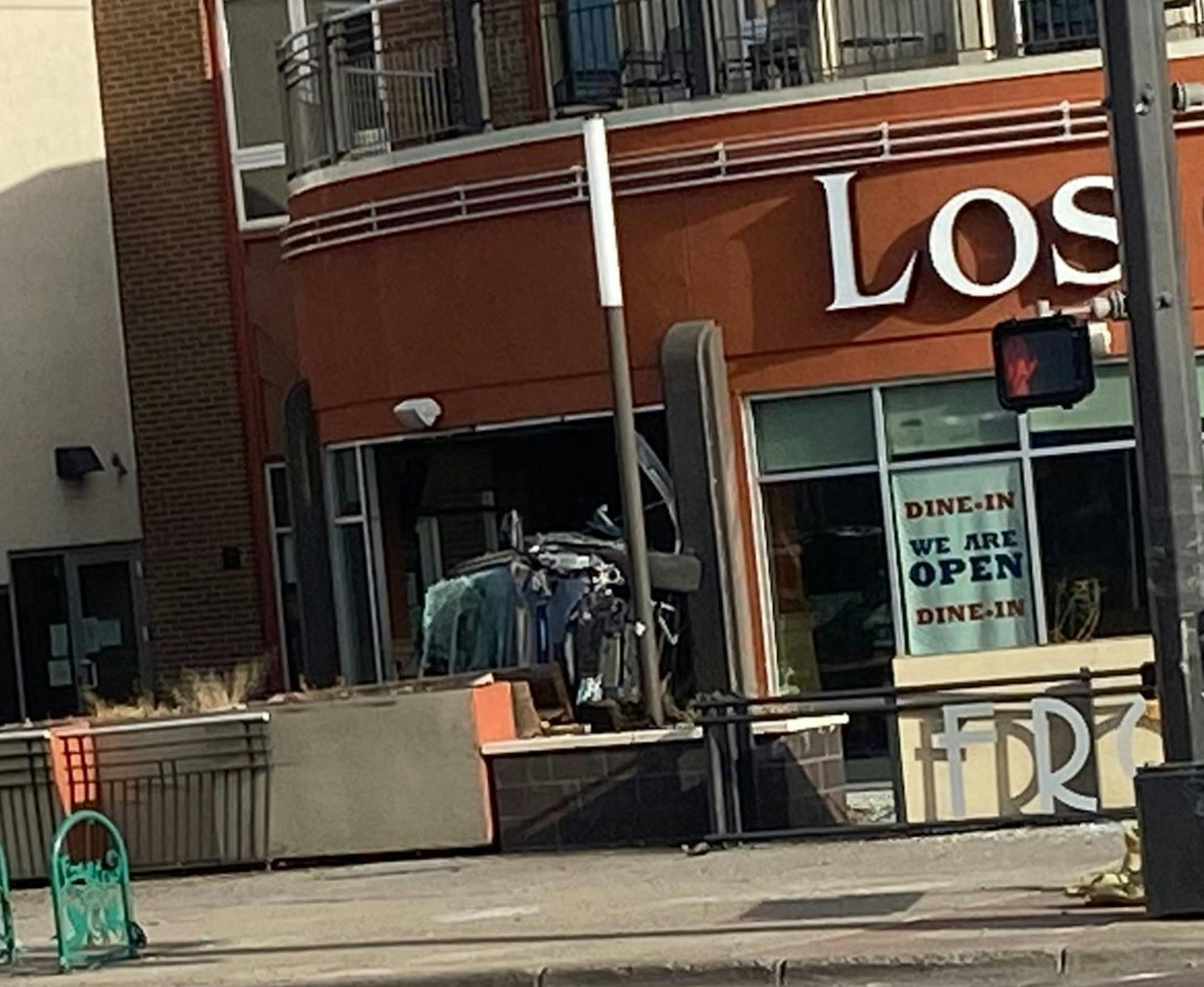 A vehicle crashed into Los Ocampo on University Avenue in St. Paul on Thursday. The driver was being treated at Regions Hospital for injuries not believed to be life-threatening, police said.
