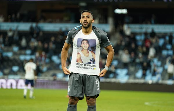 striker Ramon Abila pulled up his jersey to display a T-shirt honoring his brother Gaston, who suffered from depression and committed suicide last yea