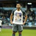 striker Ramon Abila pulled up his jersey to display a T-shirt honoring his brother Gaston, who suffered from depression and committed suicide last yea