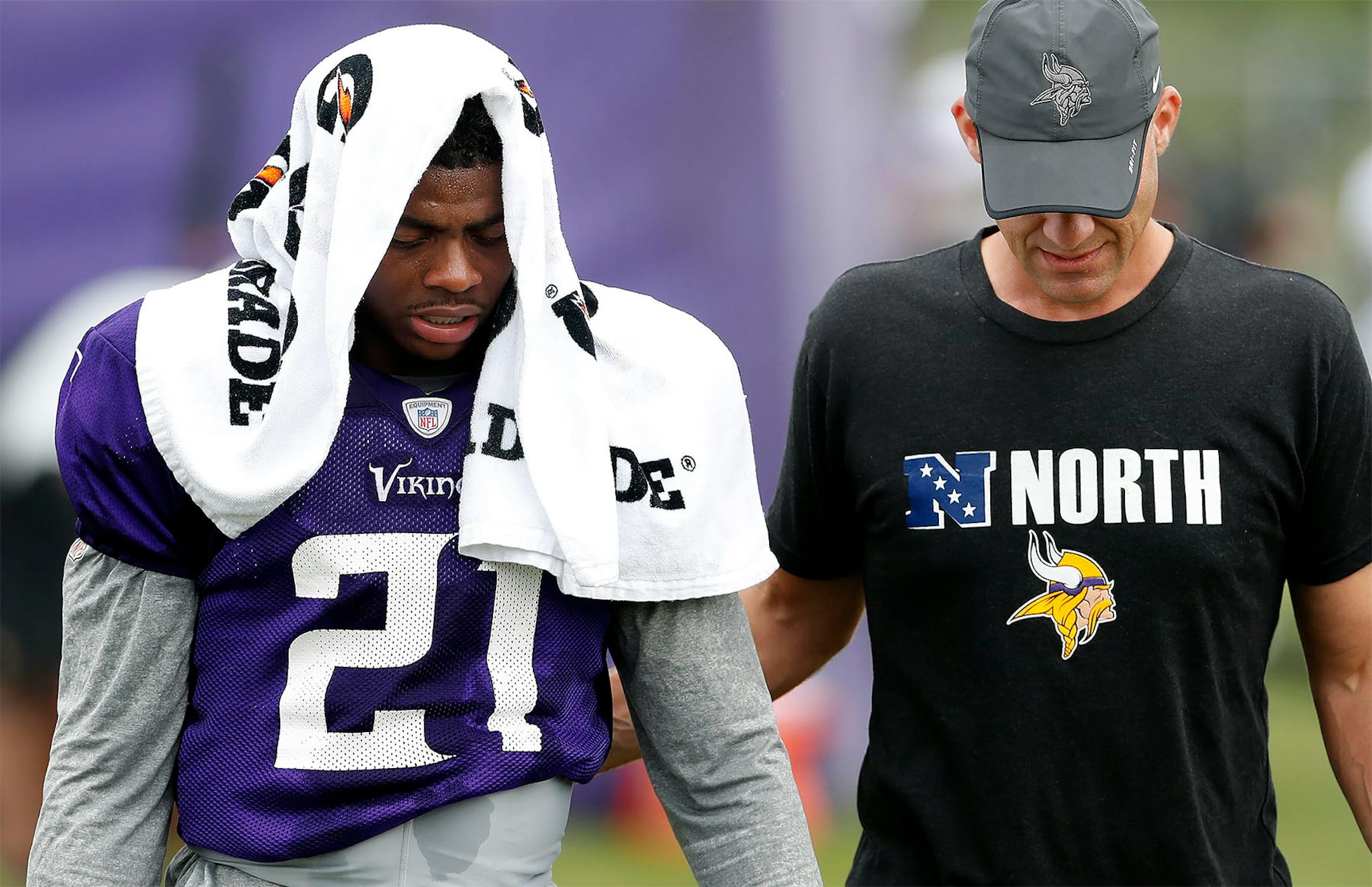 Vikings running back Jerick McKinnon walked off the field with a trainer during the afternoon practice.