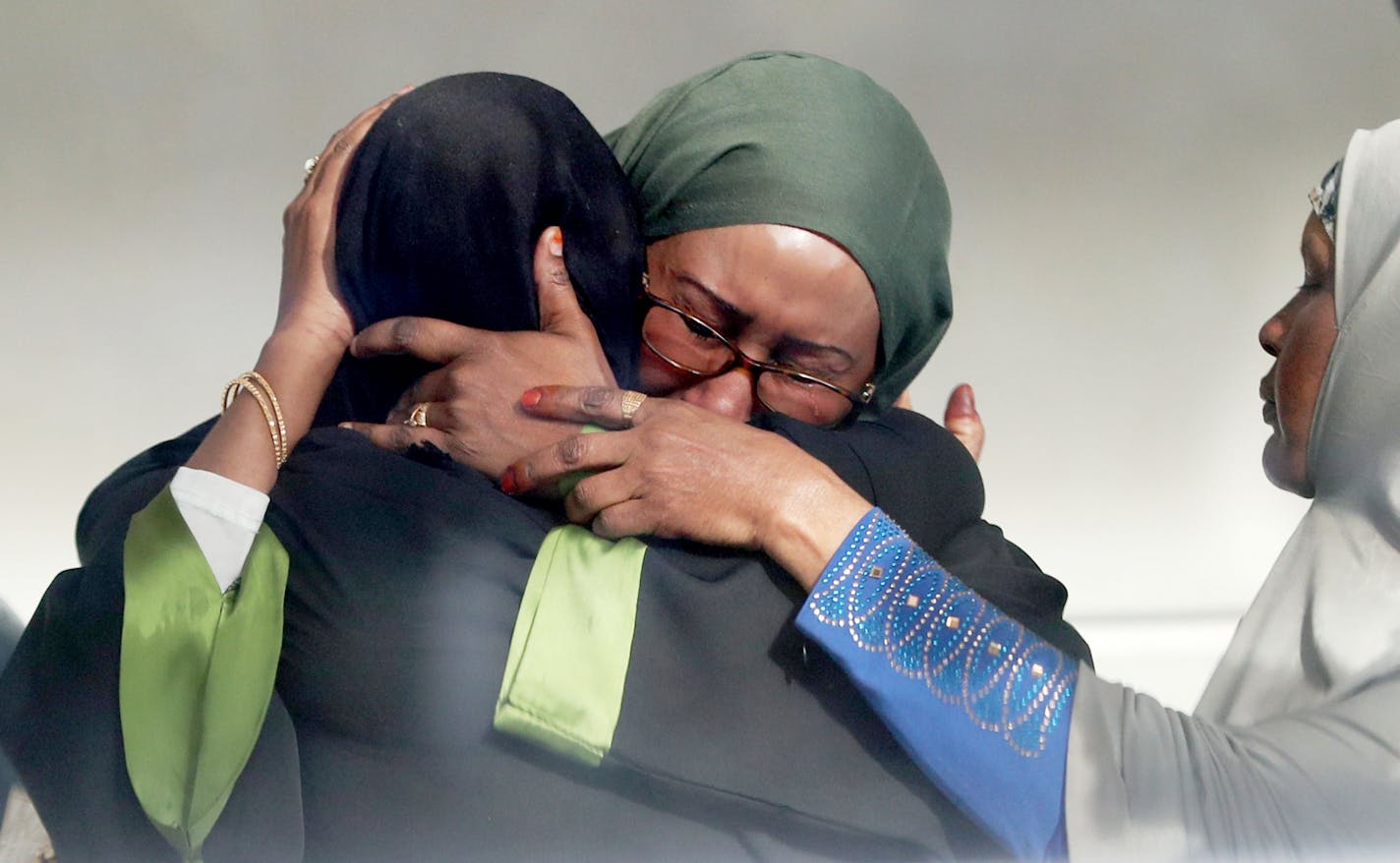 Following the sentencing of Hanad Musse to 10 years in prison and 20 years supervised release, supporters of Musse became emotional in a hallway inside the Federal Courthouse Tuesday in Minneapolis.
