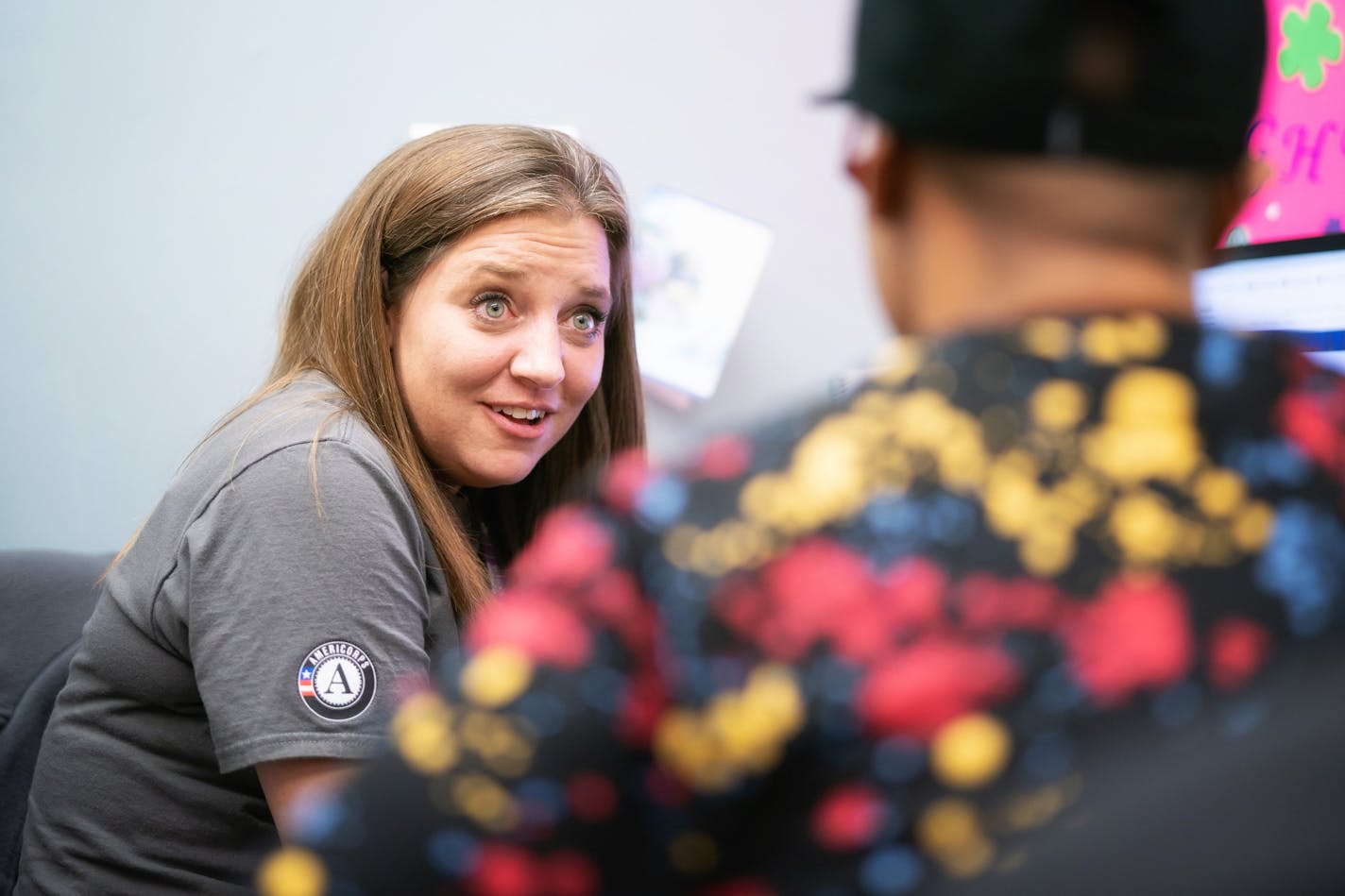 Melissa Evers works with a client at Avivo. ] GLEN STUBBE &#x2022; glen.stubbe@startribune.com Friday, August 31, 2018 AmeriCorps member Melissa Evers is serving in Minnesota&#x2019;s first-ever Recovery Corps providing peer-to-peer support for individuals overcoming addition.
Evers is a recovery navigator at the nonprofit Avivo, which helps more than 18,000 people each year, with recovery, employment, and economic advancement.
Evers, who used to work with people with disabilities, said AmeriCor