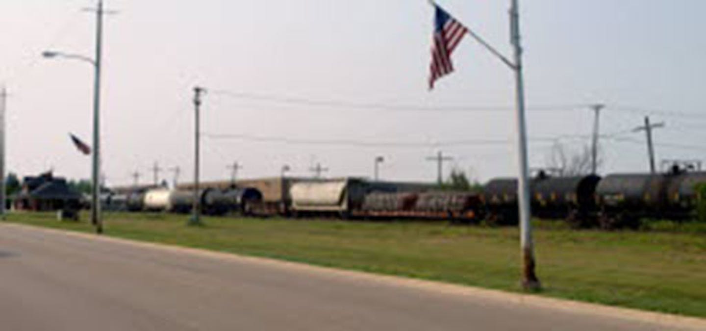 Unlike the long trains of strictly tank cars passing through the Twin Cities, the Canadian National Railway trains such as this one in Warroad, Minn., are collections of tank cars and other freight cars.