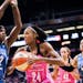 Phoenix Mercury forward DeWanna Bonner (24) goes up for a shot as Minnesota Lynx forward Rebekkah Brunson (32) defends during a WNBA basketball game F