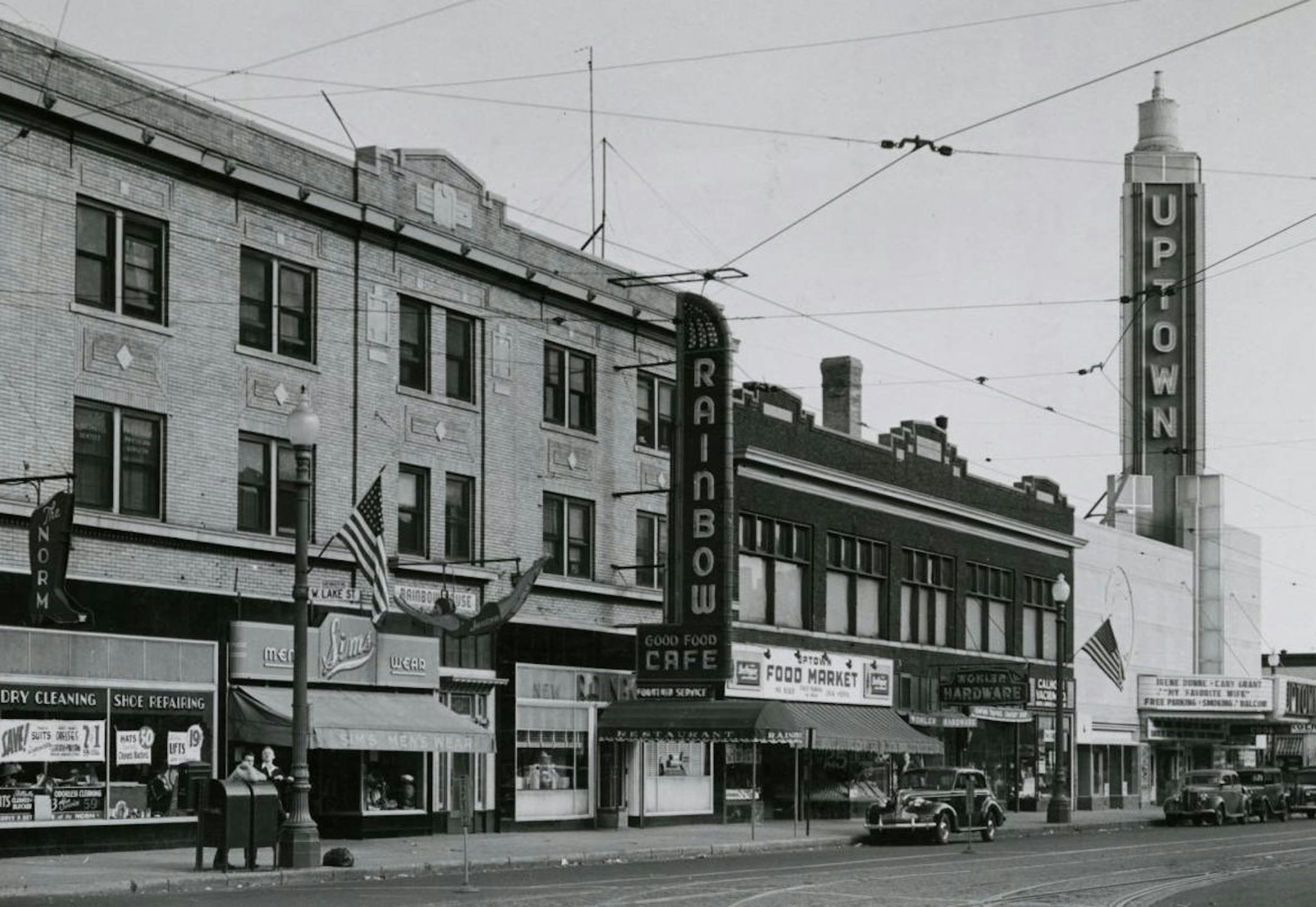 The Uptown area as it appeared in approximately 1940, after a redesign of the Uptown Theatre added the prominent mast to the building. Formerly the Lagoon Theatre, its renaming in 1929 signaled the effort to brand the Uptown district.