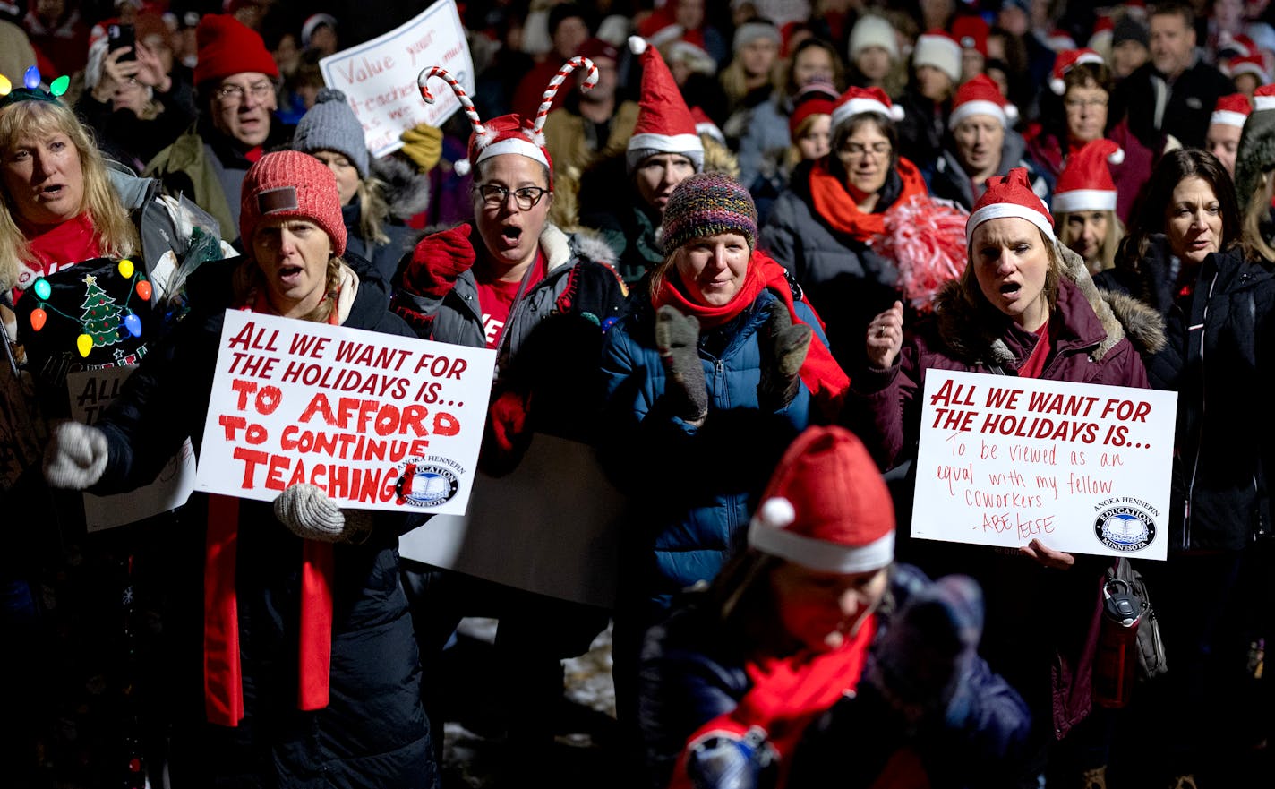 Union members, teachers and supporters cheered during a rally held by Education Minnesota outside the Anoka-Hennepin district headquarters Monday, December 11, 2023, in Anoka, Minn. ] CARLOS GONZALEZ • carlos.gonzalez@startribune.com