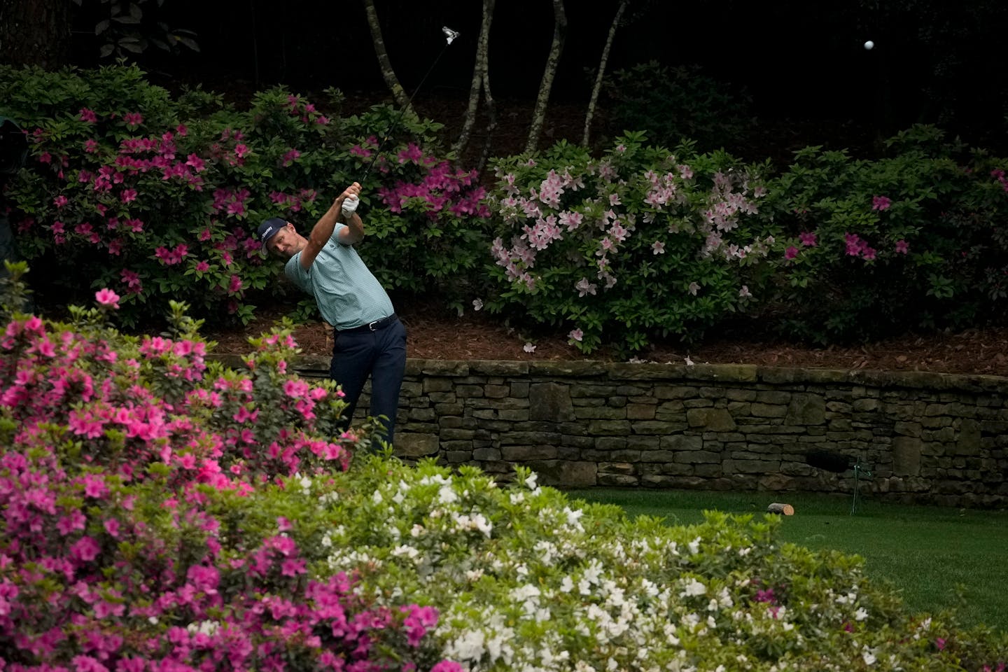 Justin Rose, of England, tees off on the 13th hole during the second round of the Masters golf tournament on Friday, April 9, 2021, in Augusta, Ga. (AP Photo/Charlie Riedel)