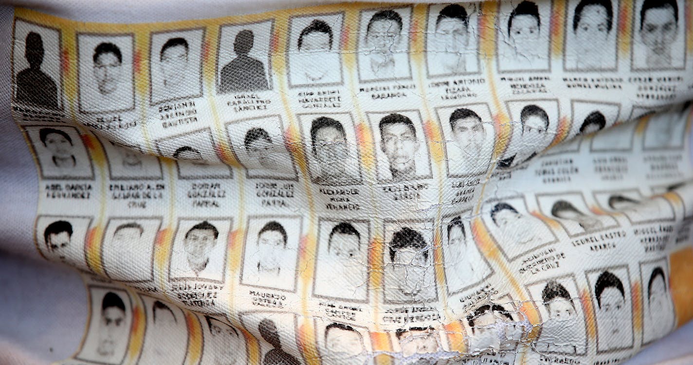 Carmelo Ramirez Morales wore a t-shirt baring the faces of 43 students who disappeared in the Mexican state of Guerrero in 2014 at an attorney's office, Thursday, April 28, 2016 in Minneapolis, MN. ] (ELIZABETH FLORES/STAR TRIBUNE) ELIZABETH FLORES &#x2022; eflores@startribune.com