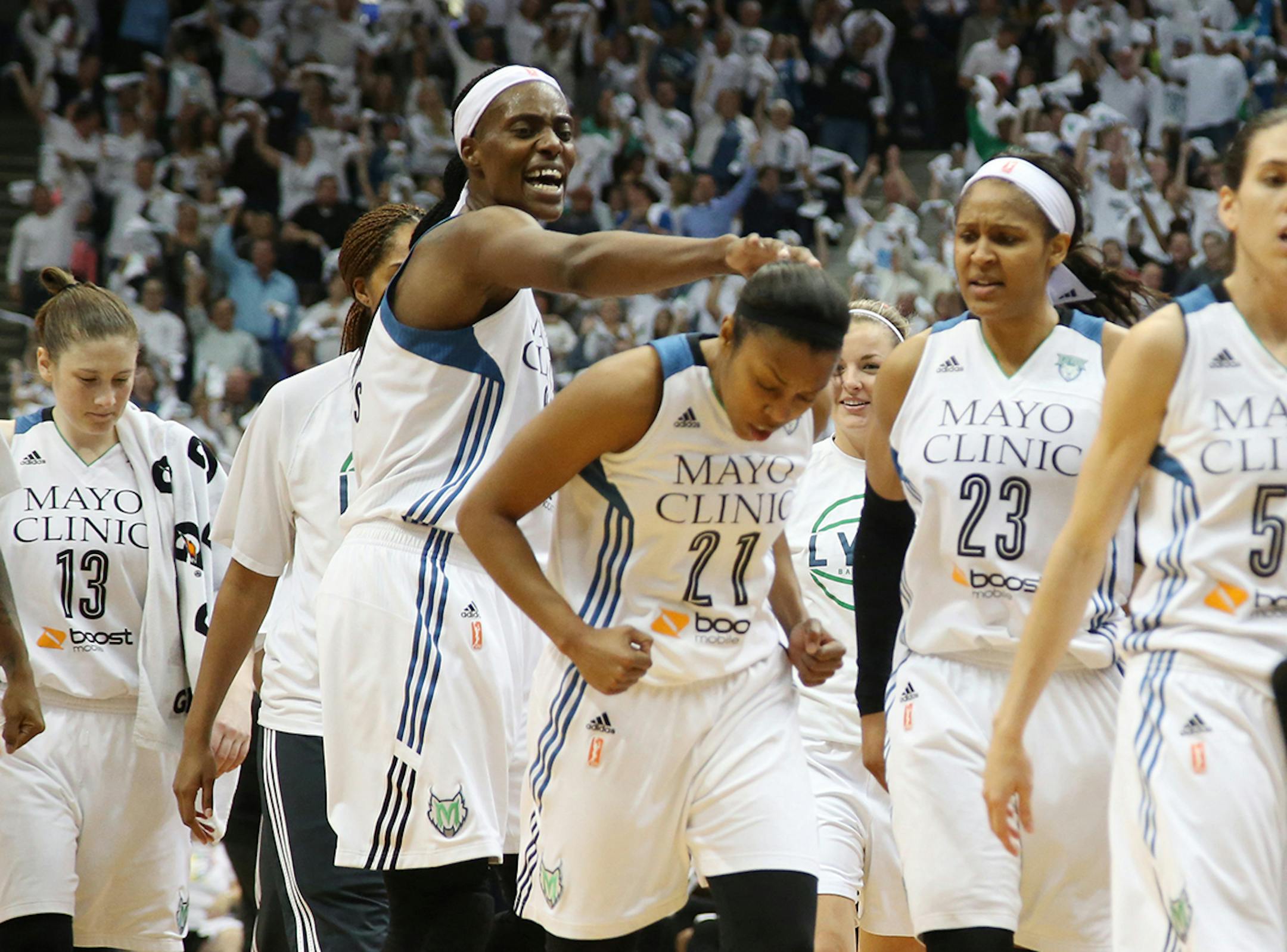 Minnesota Lynx center Sylvia Fowles (34) congratulates Minnesota Lynx guard Renee Montgomery (21) during the second half.