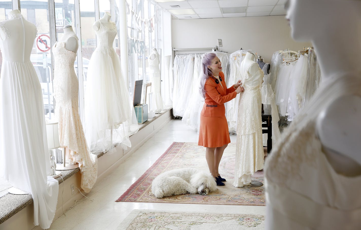 Owner Nikolina Erickson-Gunther dresses a mannequin with her poodle Pierre at Andrea's Vintage Bridal in Minneapolis. ] LEILA NAVIDI leila.navidi@startribune.com / BACKGROUND INFORMATION: Monday, November 17, 2014.