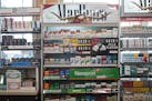 FILE - In this May 18, 2017 file photo, packs of cigarettes are offered for sale at a convenience store in Helena, Mont. A tobacco industry-funded gro