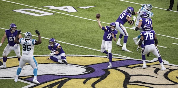 Vikings quarterback Kirk Cousins (8) threw a pass during the game-winning drive.