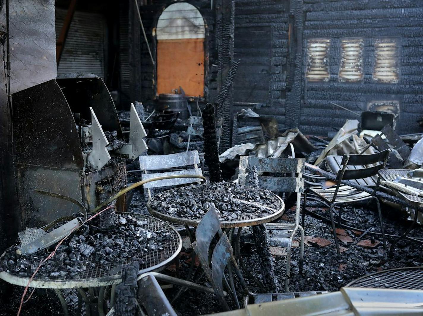 The burned out interior of Lola after an early morning fire that destroyed the restaurant on bde maka ska Thursday, May 16, 2019, in Minneapolis, MN.