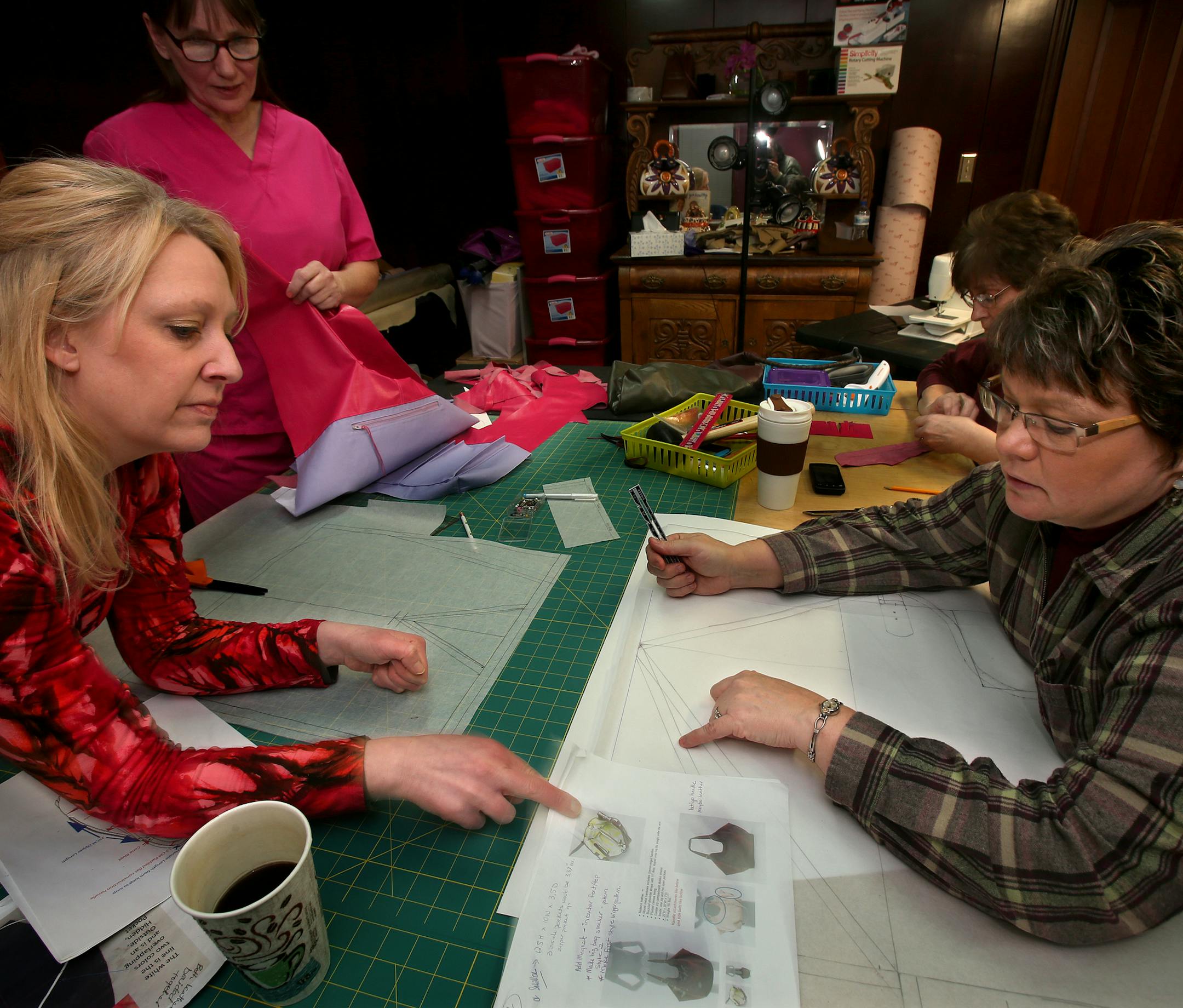 From left, Krista Olson, Sherry Hinkley, Cindy Fenstermacher and Jane Roemer worked on handbags made in a makeshift garment factory in downtown Wabasha. The handbags will soon be made at a new factory being built out of the old Arrowhead Bluffs Museum..