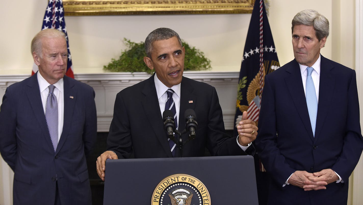 FILE - In this Nov. 6, 2015 file photo, President Barack Obama, accompanied by Vice President Joe Biden and Secretary of State John Kerry, announces he's rejecting the Keystone XL pipeline because he does not believe it serves the national interest, in the Roosevelt Room of the White House in Washington. In the end President Barack Obama hardly had a choice. Opposition from the Democratic base had grown so intense that Obama would have faced enormous political blowback had he approved the Keysto