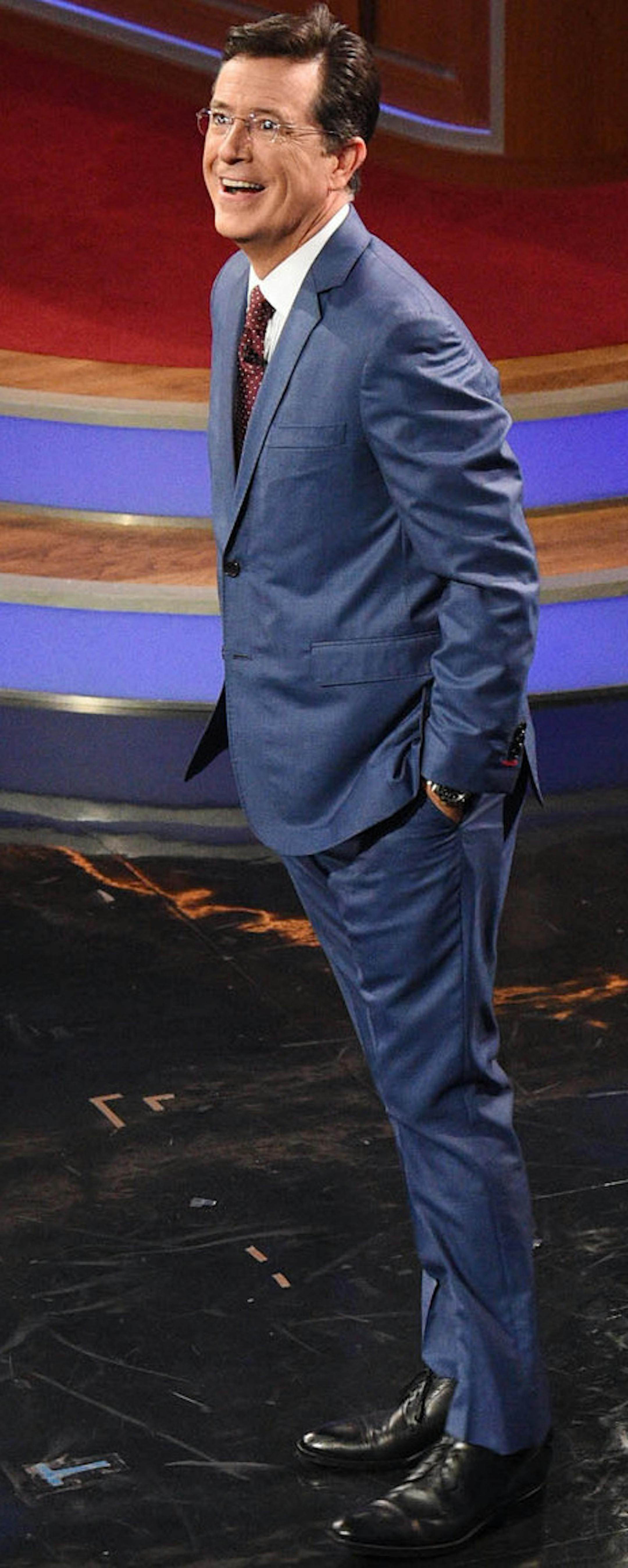 Stephen Colbert hosts the premiere episode of "The Late Show," Tuesday Sept. 8, 2015, in New York. Actor George Clooney and Republican presidential candidate Jeb Bush were the guests for Colbert's debut. (Jeffrey R. Staab/CBS via AP)