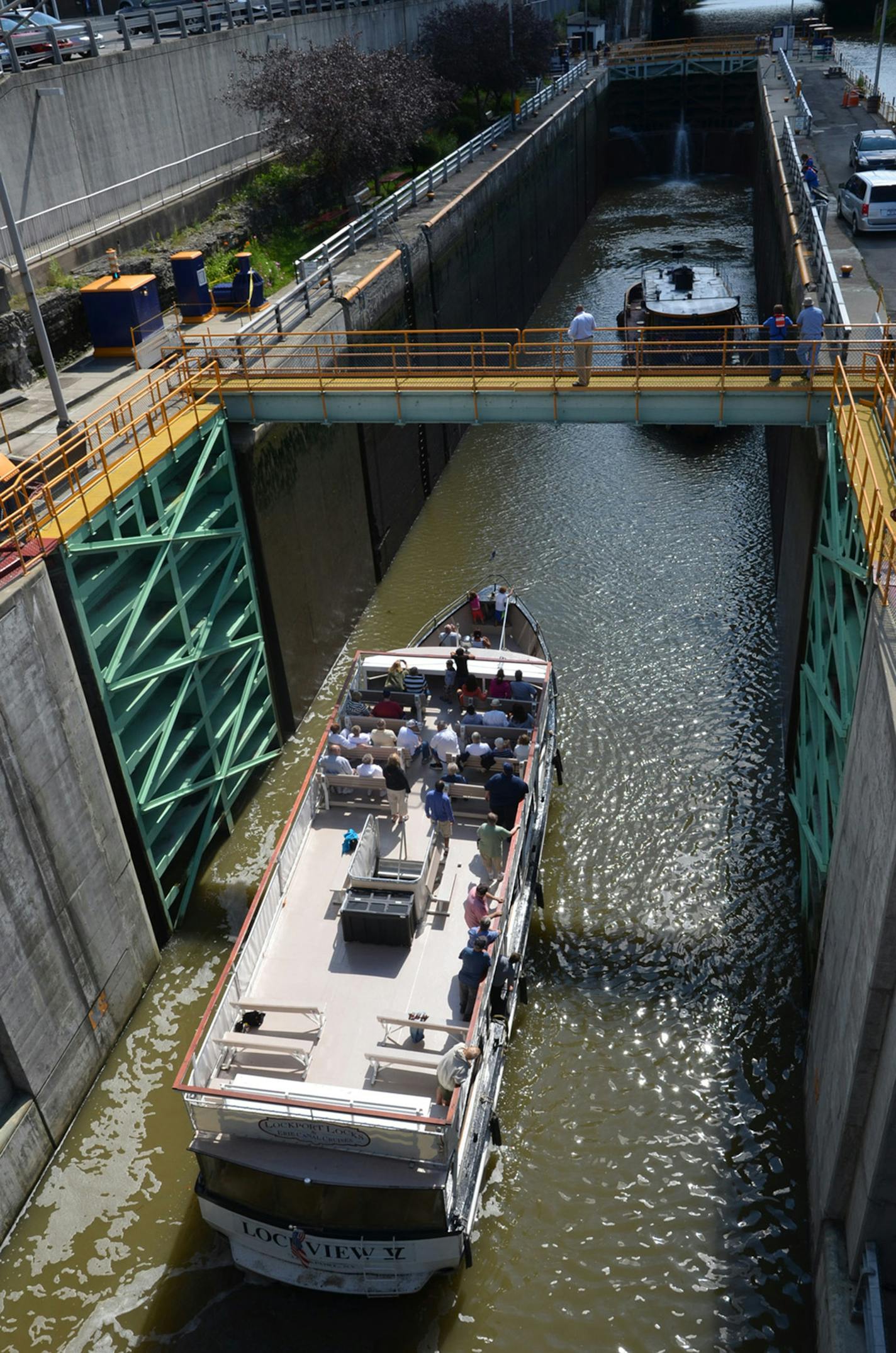 New York's Canal System has been in continuous operation since it opened 1825. More than 500 miles of interconnected canals, rivers, and lakes attract tour boats, cruisers, kayaks, and crew teams, as well as commercial traffic and historic vessels. Here, tour boats enter a lock in Lockport, N.Y. (Duncan Hay/Erie Canalway National Heritage Corridor)