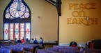 Members of prayer group that meets four days a week gather for what they call centering prayer, silent prayer/contemplation in the church sanctuary of