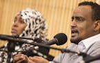 Haji Yusuf, a Somali-American community advocate in St. Cloud, participates in a forum discussion entitled "Muslims in Minnesota: A community conversa