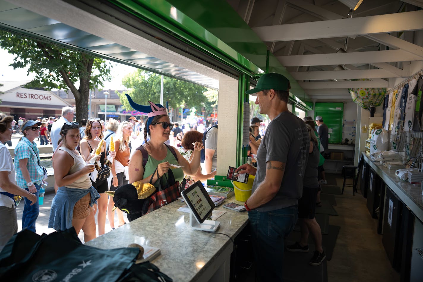 Star Tribune publisher Steve Grove spoke at the Star Tribune State Fair booth with Kyndell Harkness and also worked inside the booth Wednesday, Aug. 30, 2023 Falcon Heights, Minn. ] GLEN STUBBE • glen.stubbe@startribune.com