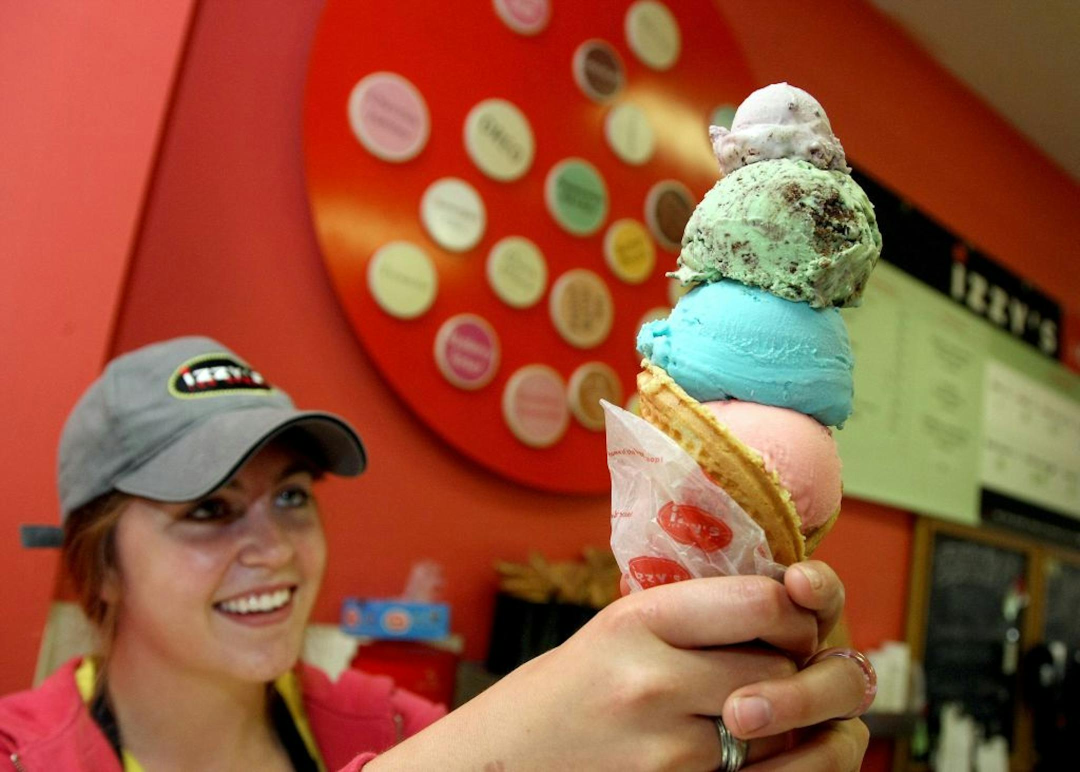 In 2009 Martha Tobin demonstrated her scooping skills as a shift manager at Izzy's in St. Paul. These days she's the store's assistant manager.