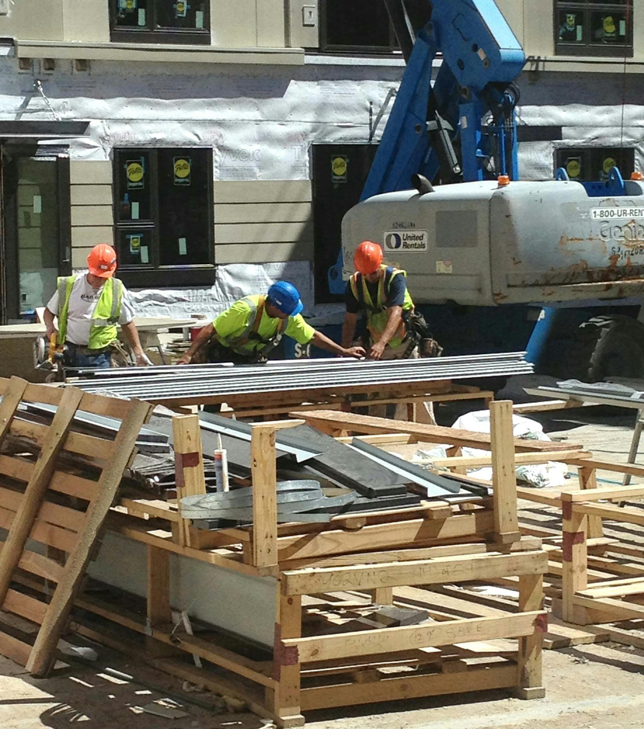 Construction of the second phase of the Elan Uptown apartments on 28th and Dupont Avenue in the Uptown neighborhood helped boost housing construction nearly 40 percent during June. Such multi-family buildings accounted for half of all housing construction last month. Photo by Jim Buchta/Star Tribune