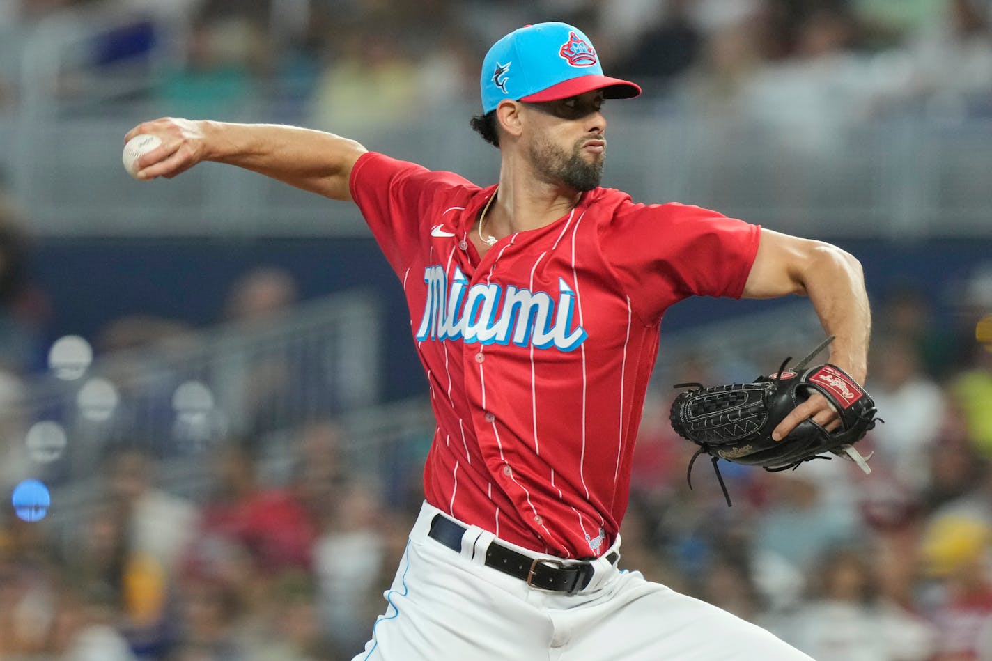 Miami Marlins pitcher Jorge Lopez aims a pitch during the eighth inning of a baseball game against the Detroit Tigers, Saturday, July 29, 2023, in Miami. (AP Photo/Marta Lavandier)