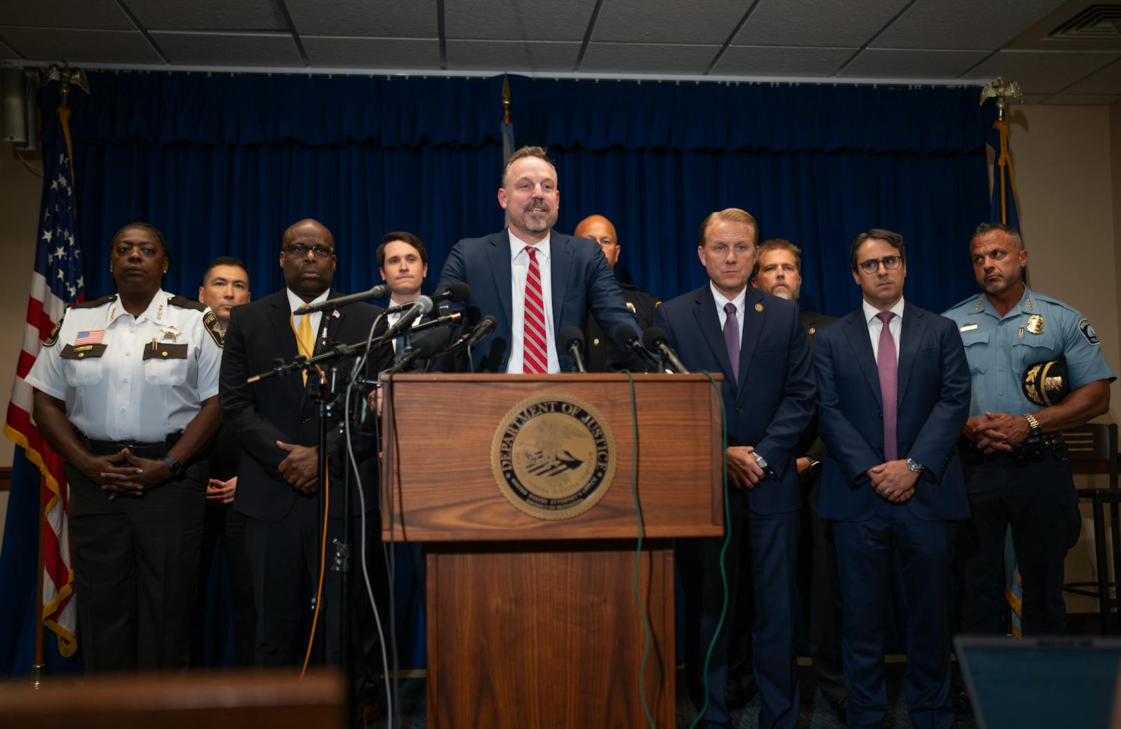 Acting U.S. Attorney Joseph H. Thompson, center, flanked by representatives of other agencies involved, announced expanded charges against accused murderer Vance Boelter during a news conference Tuesday, July 15, 2025 at the U.S. Attorney’s office in Minneapolis.    JEFF WHEELER • Jeff.Wheeler@startribune.com
