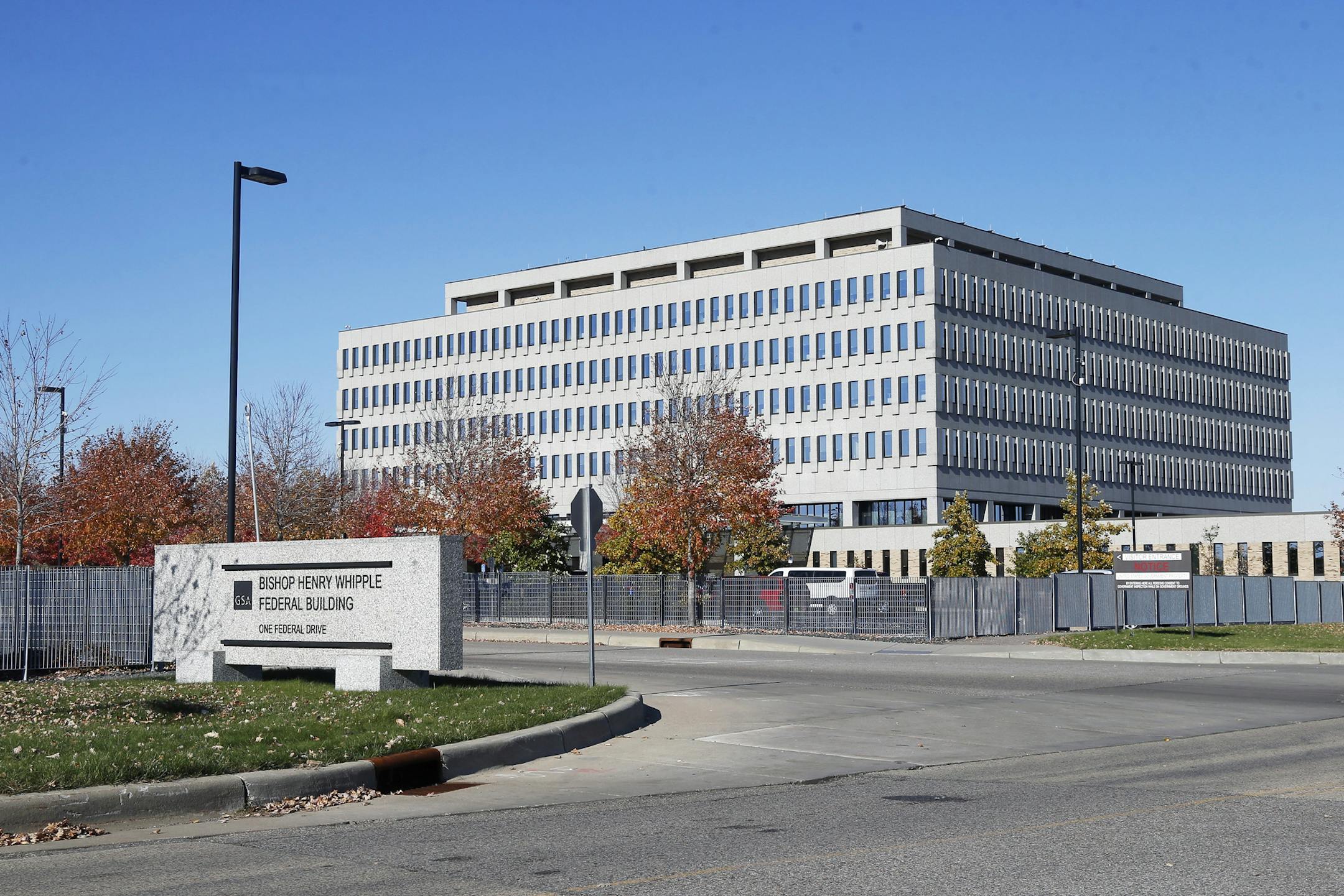 In this Oct. 25, 2019 photo, the Bishop Henry Whipple Federal Building is shown. Clergy and immigration activists in Minnesota are trying to remove the name of the revered bishop from a federal building where hundreds of deportation orders are issued every year, calling the Trump administration's immigration crackdown an affront to his memory. (AP Photo/Jim Mone)