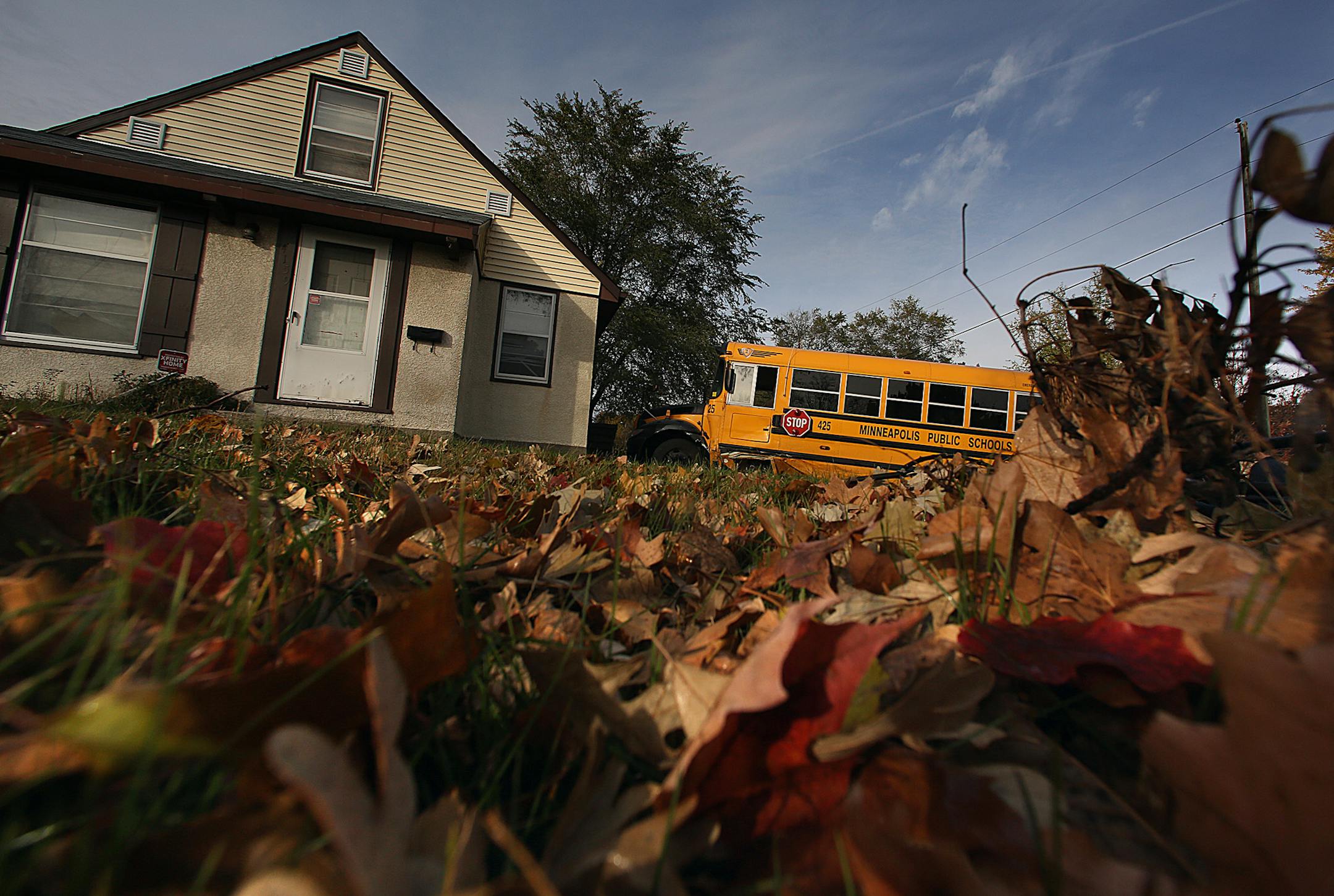 A school bus collided with another vehicle at the intersection of Penn Ave. N. and 42nd Ave, forcing the bus to then run into a nearby home. ] (JIM GEHRZ/STAR TRIBUNE) / November 5, 2013, Minneapolis, MN