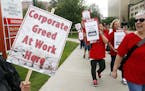 Allina Health nurses protest outside Abbott Northwestern Hospital in Minneapolis on Monday, Sept. 5, 2016 as they began an open-ended strike after a f