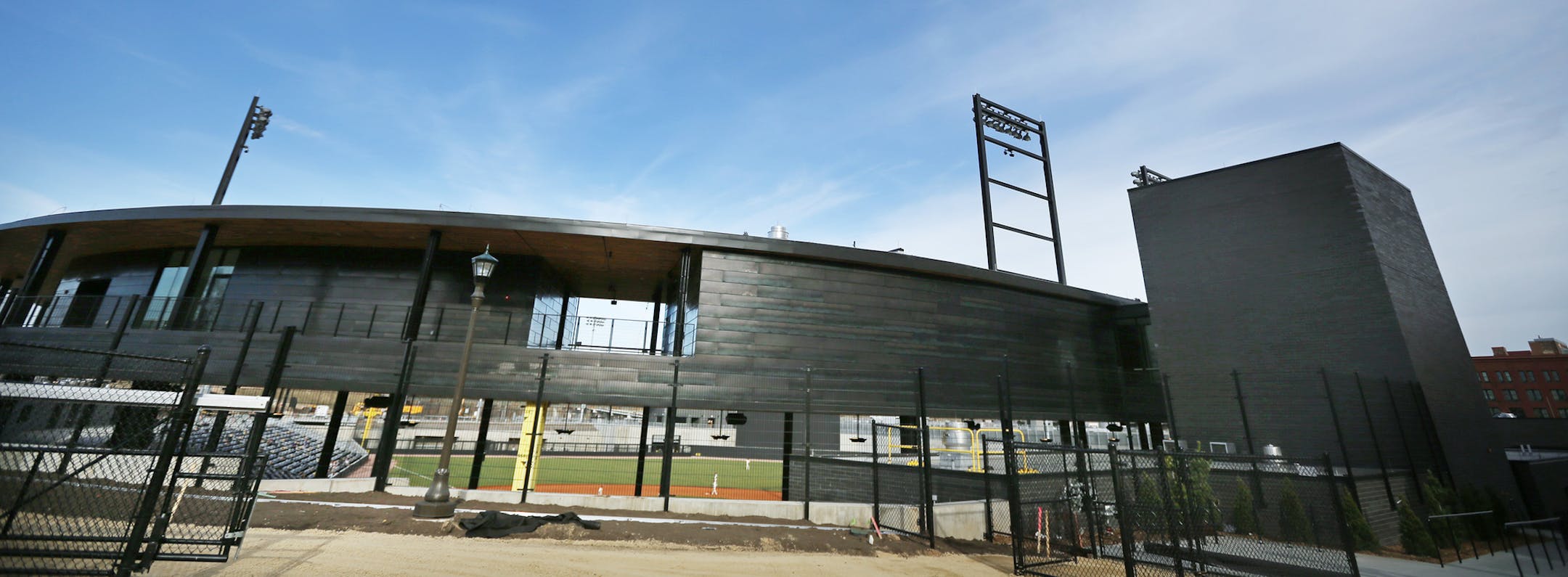The blackened-steel exterior lends a boldly modern look to the St. Paul Saints’ new CHS Field, yet it complements the historic character of its Lowertown setting.