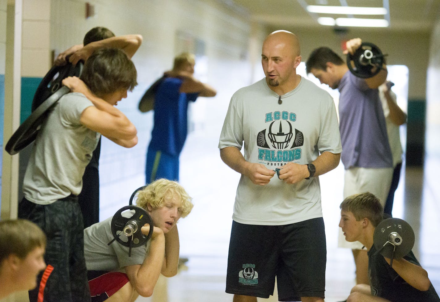 Coach David Blom during practice at Atwater-Cosmos-Grove High School in Grove City, Minn., on Monday October 5, 2015. ] RENEE JONES SCHNEIDER &#x2022; reneejones@startribune.com The coach of the Atwater-Cosmos-Grove City football team in central MN is focusing on more than Xs and Os. He's taking his team through some unusual non-athletic exercises to help them become respectful, responsible men, especially to women.