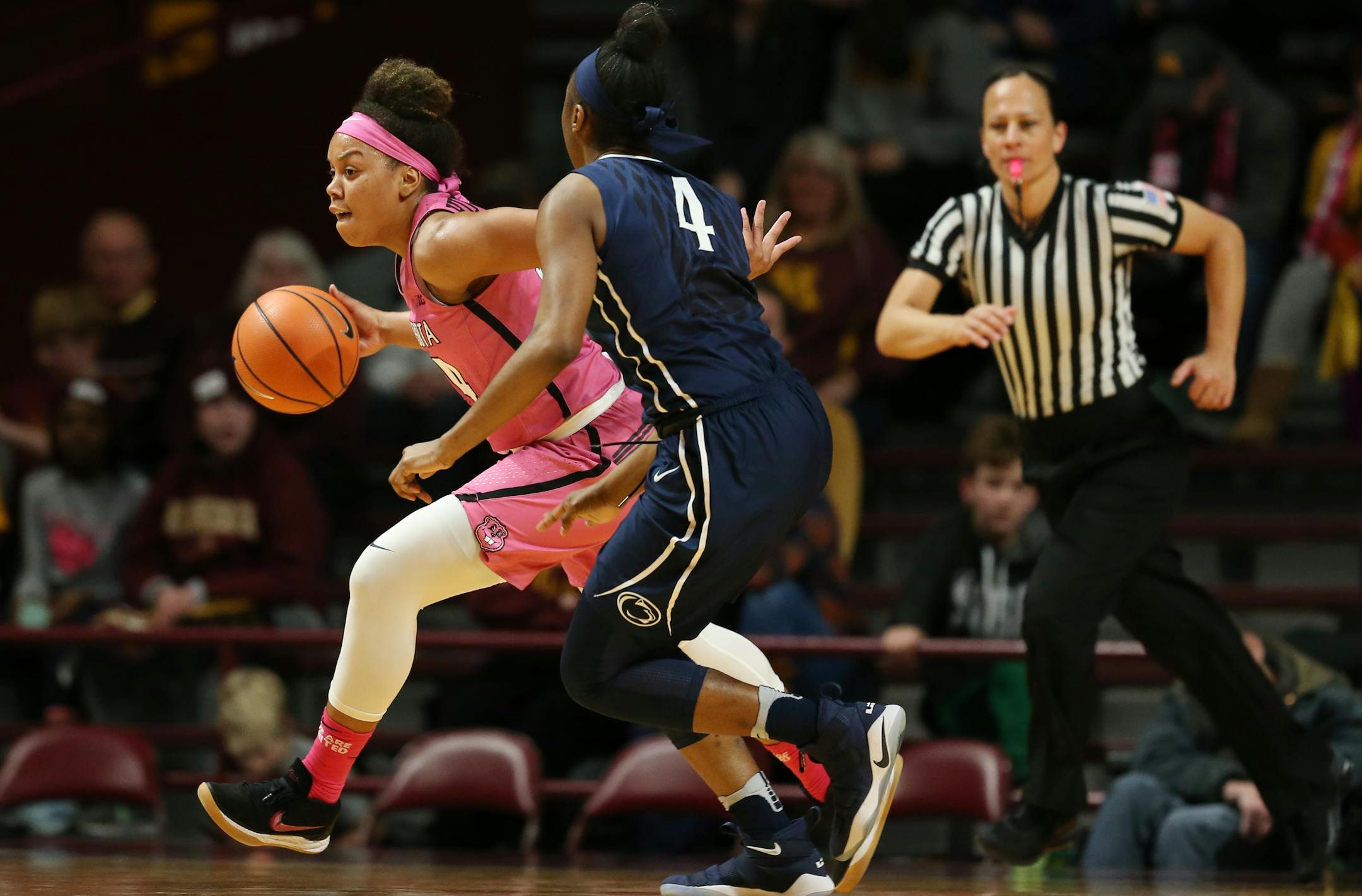 Gophers guard Gadiva Hubbard dribbled past Penn State guard Siyeh Frazier in the second half at Williams Arena on Sunday. Hubbard led all scorers with 25 points in Minnesota's 101-68 victory.