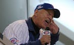 Actor Bill Murray sings "Take Me Out to the Ball Game" during Game 3 of the World Series between the Chicago Cubs and Cleveland Indians on Friday, Oct