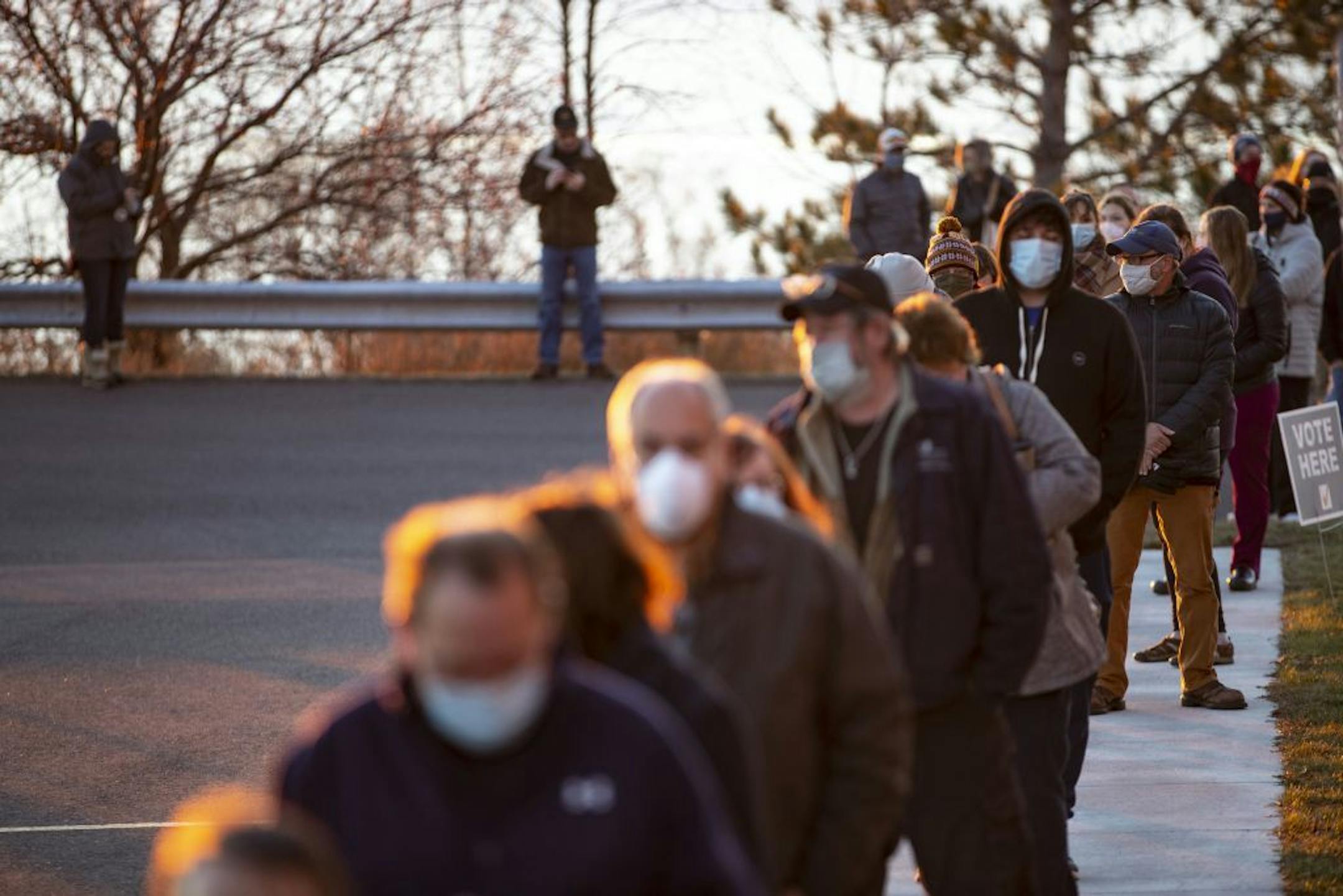 A long line of voters formed outside of First United Methodist Church as the sun rose over Lake Superior in Duluth on Tuesday morning.