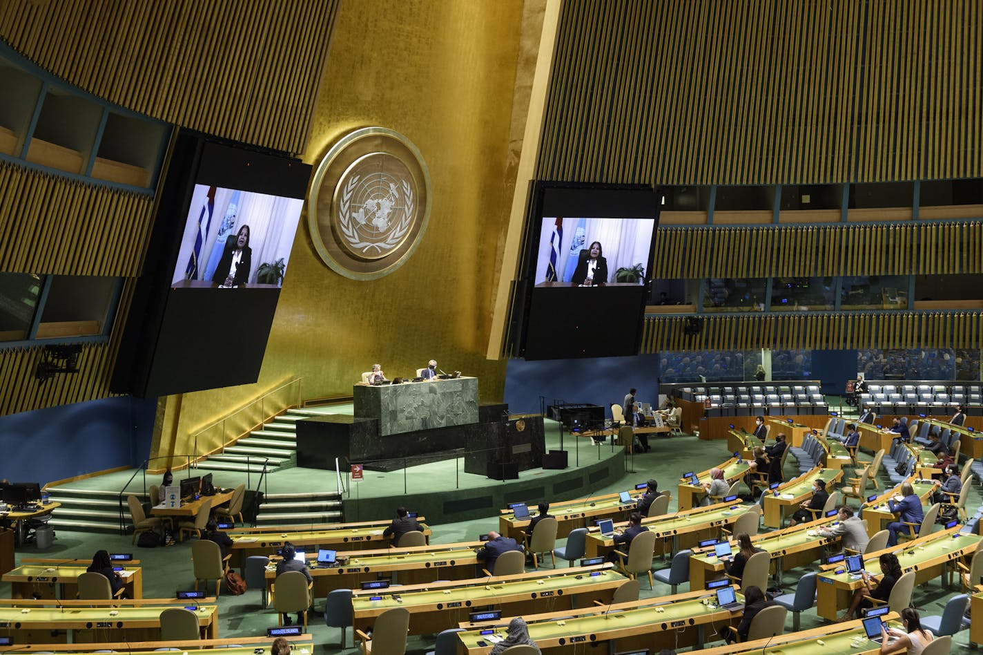 In this photo provided by the United Nations, Teresa Amarelle Boue Member of the Council of State of Cuba, speaks in the U.N. General Assembly Thursday, Oct. 1, 2020, in New York. (Loey Felipe/UN Photo via AP)