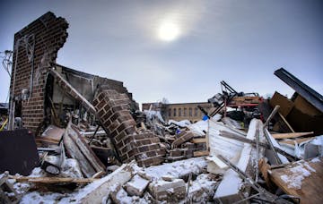 Steam still rose from the Madelia fire two days later. ] GLEN STUBBE * gstubbe@startribune.com Friday, February 5, 2016 Gov. Dayton visited Madelia tw