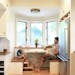 Everyday Solutions: A modest kitchen remodel creates an entry "mudroom" that doubles as a breakfast nook by K Nelson Architects. Ben Nelson and son El