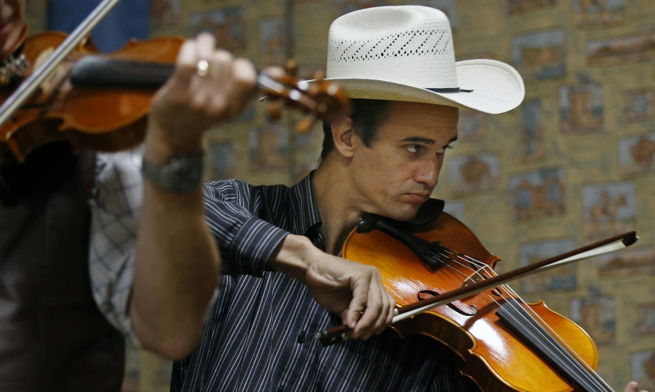At the Open Range Cowboy Church in Isanti, a cincello player is part of the band. ] tsong-taataarii@startribune.com