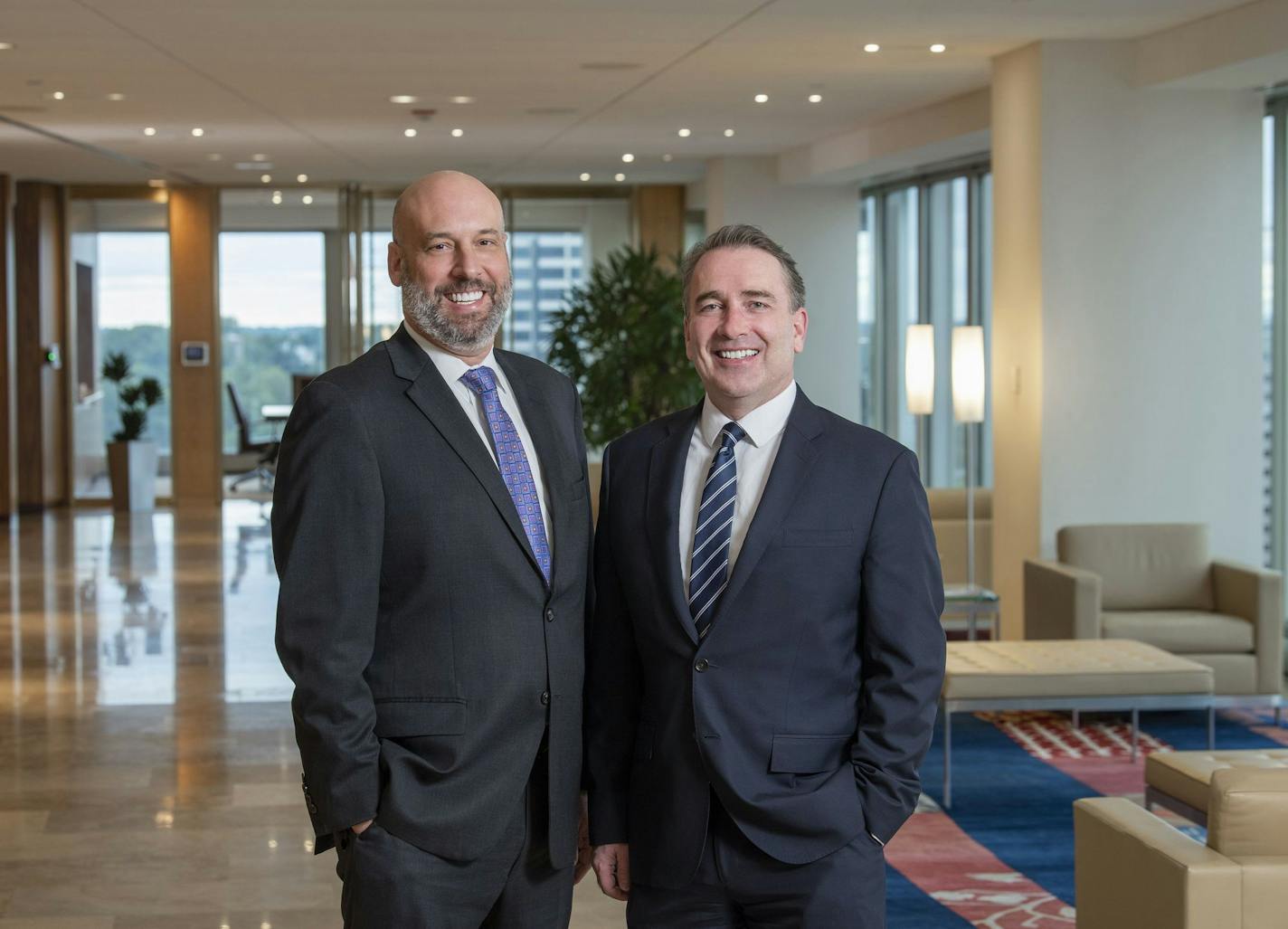 Lathrop Gage Managing Partner Cameron Garrison (left) and Gray Plant Mooty Managing Officer Michael Sullivan Jr. (right) will help lead their firms' merger to form Lathrop GPM LLP.