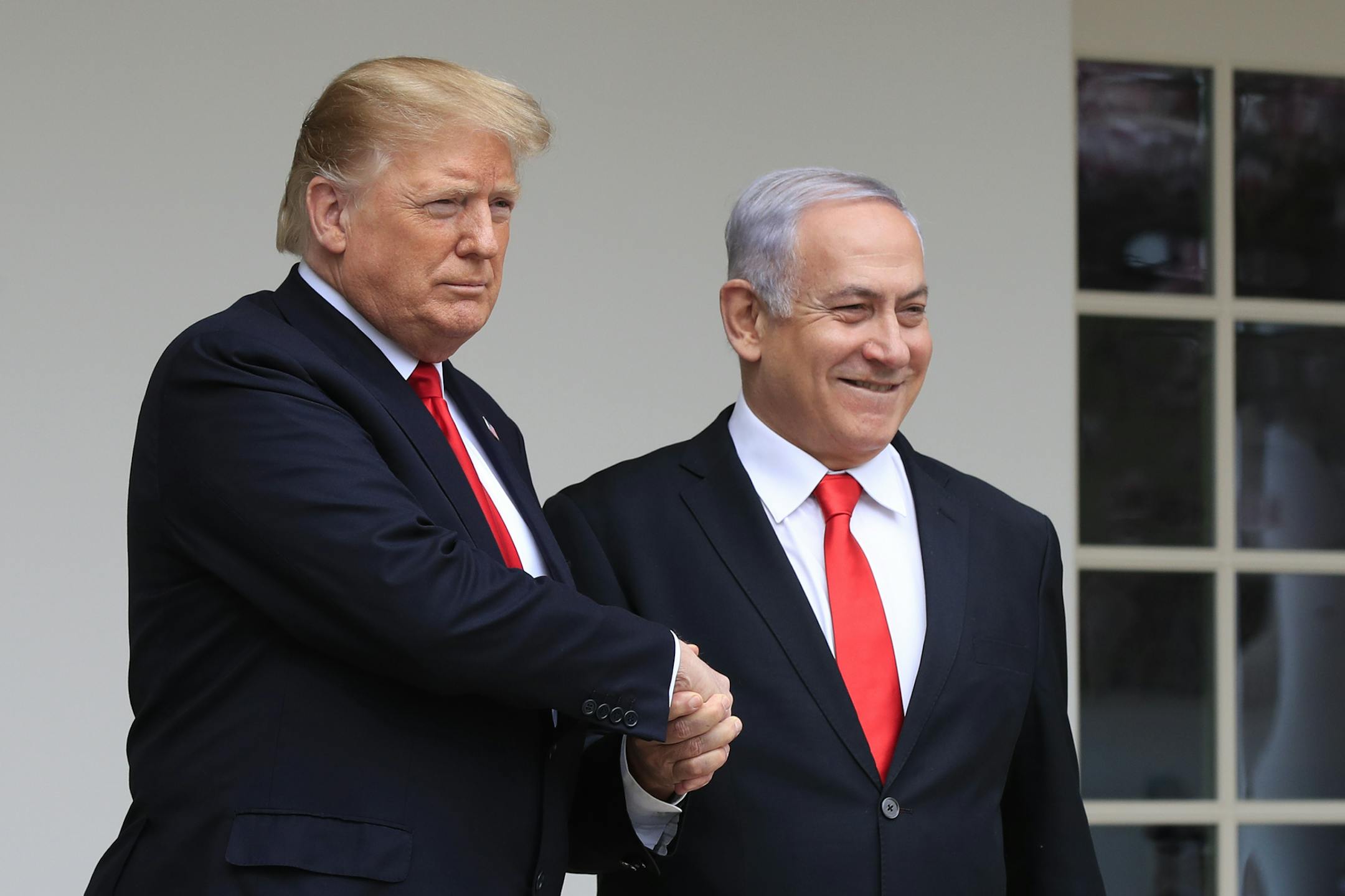 FILE - In this March 25, 2019 file photo, President Donald Trump welcomes visiting Israeli Prime Minister Benjamin Netanyahu to the White House in Washington. In the eyes of critics, Benjamin Netanyahu&#x2019;s decision to bar two Democratic congresswomen at the request of President Donald Trump is the latest reckless gamble by a prime minister willing to sacrifice Israel&#x2019;s national interests for short-term gain. And yet the pursuit of such allegedly short-term gains has kept Netanyahu in
