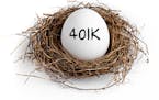 A white egg in a nest on a white background with the word 401K on the egg.